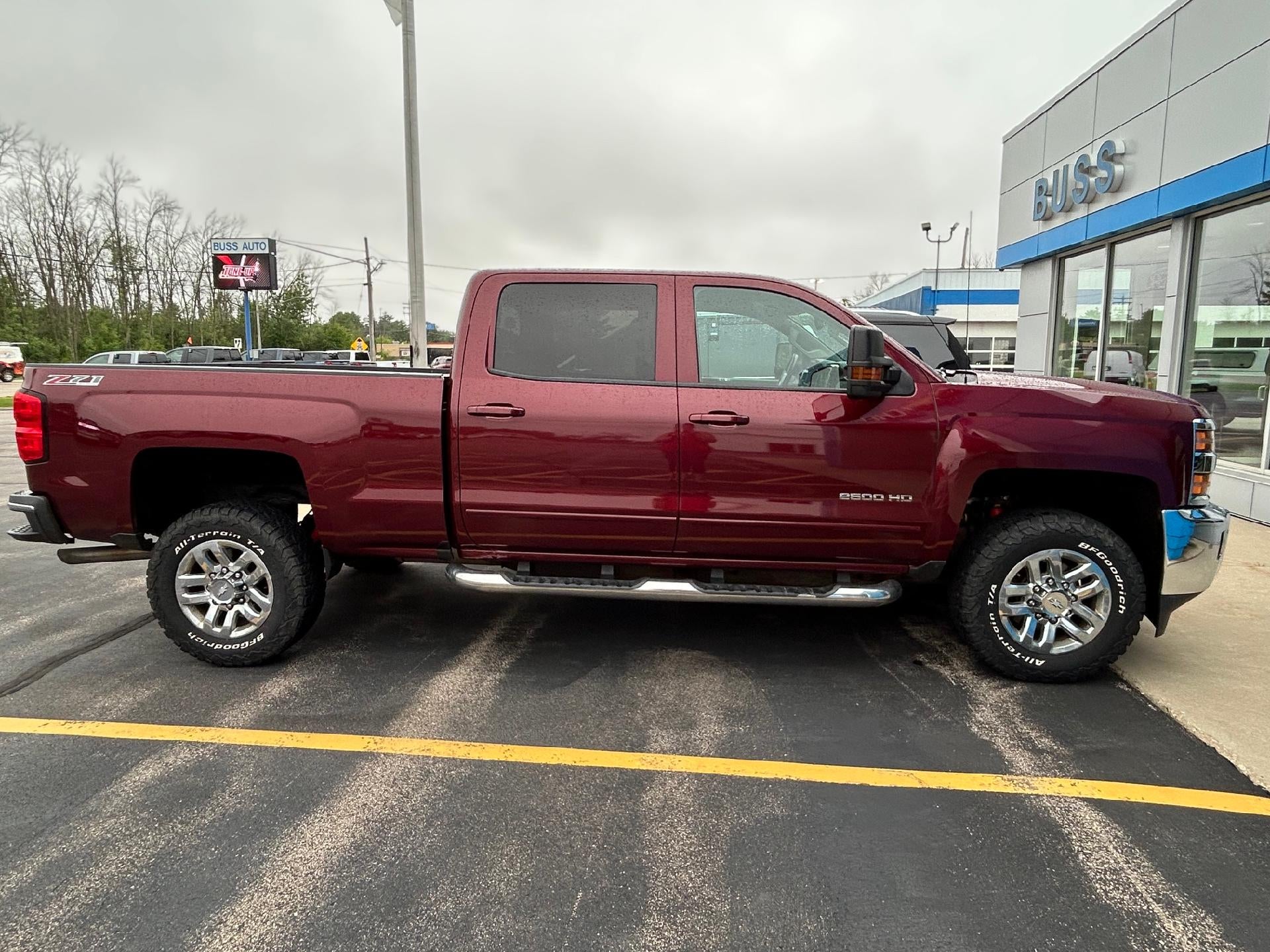 2016 Chevrolet Silverado 2500 HD LT in Butte Red Metallic — front three-quarter view