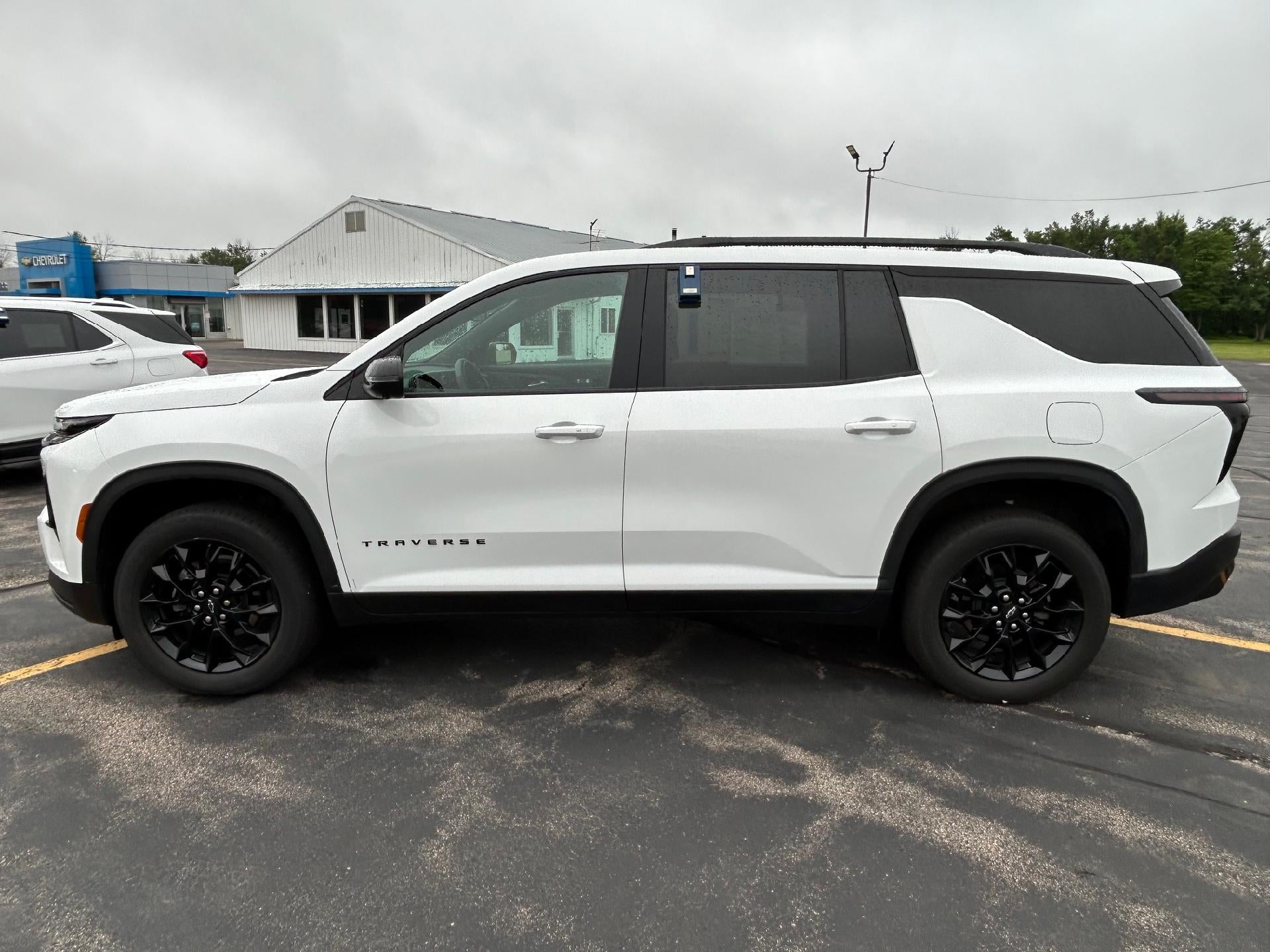 2024 Chevrolet Traverse LT in Summit White — front three-quarter view